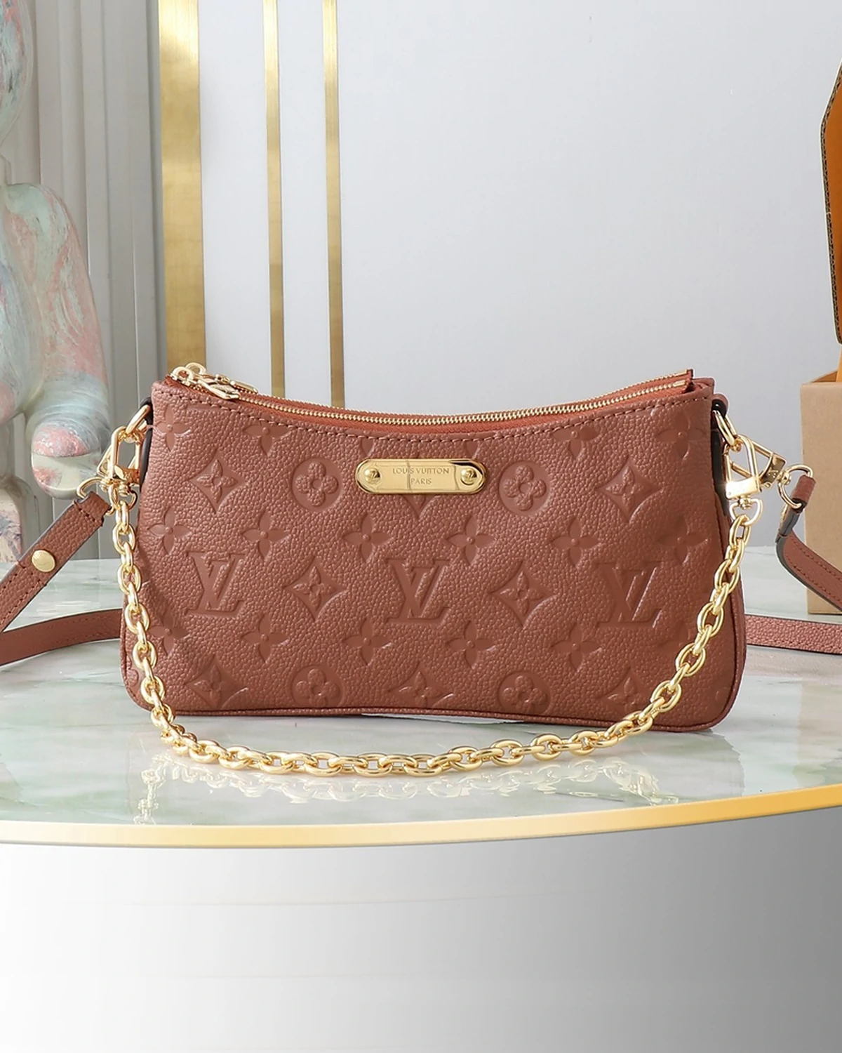 liv-pochette-monogram-empreinte-leather-cognac (2) Liv Pochette “Monogram Empreinte Leather Cognac ”